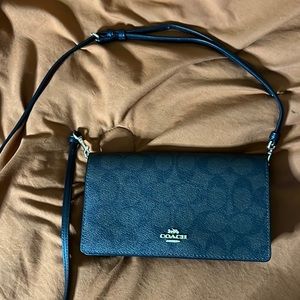 Coach Anna Foldover crossbody clutch in signature canvas